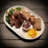 Качка фарширована під соусом